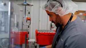 nuEra team member John Davey working on infused drinks